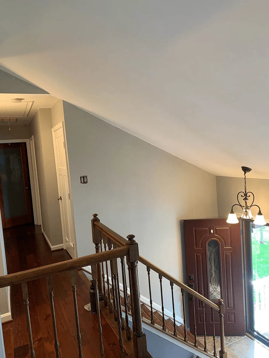 Hallway and stairwell painted light gray